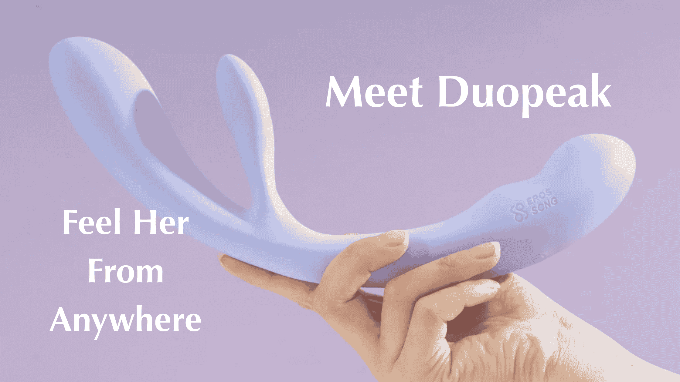Hand holding Duopeak vibrator designed for long-distance lesbian intimacy.